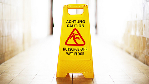 Warnaufsteller Achtung Rutschgefahr WET FLOOR