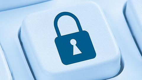 Eine Computertastatur mit einem Symbol für ein Vorhängeschloss
